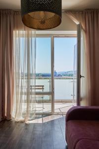 Khu vực ghế ngồi tại Konstanzer 103 - 2 camere, bucatarie, baie, parcare pazita, TV, Wi-Fi, utilat complet