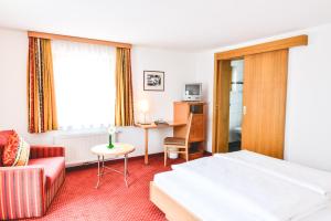 Łóżko lub łóżka w pokoju w obiekcie Hotel-Pension Hoferhaus