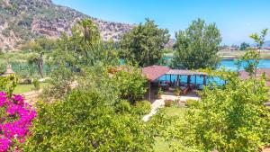 an image of a house with a view of the water at Dalyan Pension in Dalyan