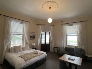 Postel nebo postele na pokoji v ubytování Bompas At Beachport