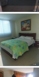 a bedroom with a bed with a quilt on it at Chipipe Riviera del Mar in Salinas