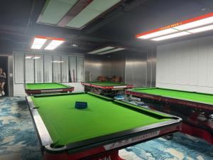 a room with several pool tables in it at Crowne Plaza Hotel in Bắc Ninh +6 photos