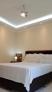 Ένα ή περισσότερα κρεβάτια σε δωμάτιο στο Apartamento próximo a praia - Paraty e Angra