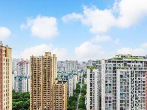 a view of a city with tall buildings at Jiuwu Hotel Chongqing in Chongqing