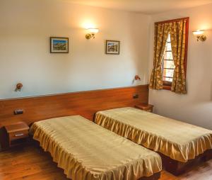 a room with two beds and a window at Yagnevo Complex in Yagnevo +36 photos