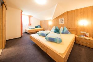 Postel nebo postele na pokoji v ubytování Gästehaus Stefan Klotz + 37 fotografií