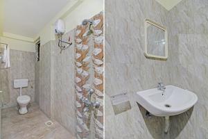 une salle de bain avec un lavabo et des toilettes dans l'établissement Hotel O Pioneer 2, à Hinjawadi 24 autres photos