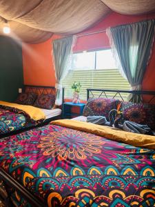 Postel nebo postele na pokoji v ubytování Cà's Garden