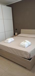 Postel nebo postele na pokoji v ubytování Appartamento Cuore Veneto