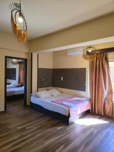Postel nebo postele na pokoji v ubytování Ghazala Bay Hotel + 9 fotografií