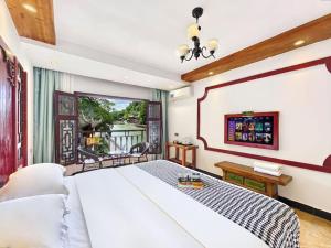 Billede fra billedgalleriet på Fenghuang Tujia Ethnic Minority River View Hotel i Fenghuang