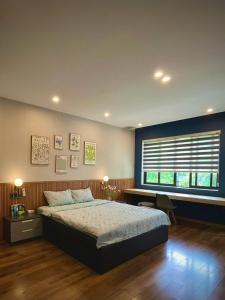 Postel nebo postele na pokoji v ubytování Aurora Homestay Quảng Ngãi