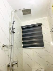 Ένα μπάνιο στο Cosy lovely studio apartment in Lagos +9 φωτογραφίες