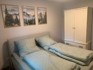 Postel nebo postele na pokoji v ubytování Ferienwohnung Unterm Nastberg