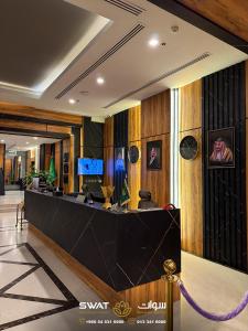 a lobby of a hotel with a reception desk at سوات للشقق المخدومة 5 in Al Khobar