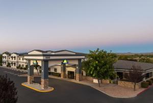 a rendering of a rendering of a hotel at Days Inn by Wyndham Chino Valley in Chino Valley