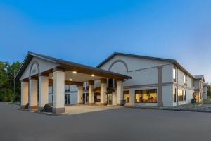 a large white building with a lot of windows at Days Inn by Wyndham Blairsville in Blairsville
