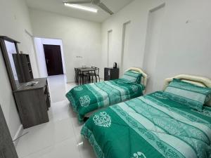 Gallery image of Near Airport Rooms in Mawāliḩ +10 photos