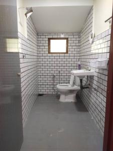 Ένα μπάνιο στο Teratak Desa Cemerlang 3