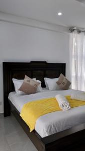 Ένα ή περισσότερα κρεβάτια σε δωμάτιο στο Kathy's place in Nyali +11 φωτογραφίες