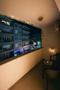 a room with a large window on the wall at Apartman Sofija centar in Teslić