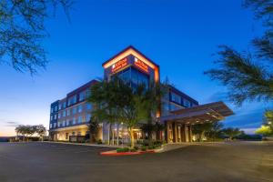 a hotel with a sign on the side of a building at Hilton Garden Inn North Phoenix Scottsdale in Phoenix