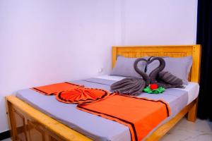 Postel nebo postele na pokoji v ubytování 86 villas trincomalee