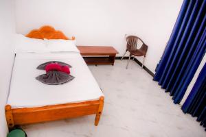 Postel nebo postele na pokoji v ubytování 86 villas trincomalee