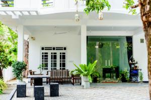 Zahrada ubytování 86 villas trincomalee + 14 fotografií