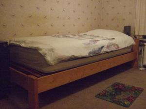 Postel nebo postele na pokoji v ubytování Bij het station van Drongen