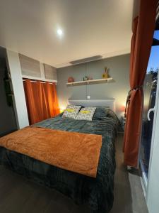 a bedroom with a bed and a window at U pino in Lumio
