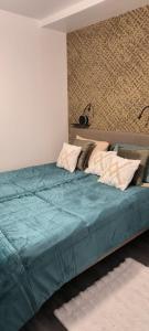 Ένα ή περισσότερα κρεβάτια σε δωμάτιο στο Domaine Mazarie