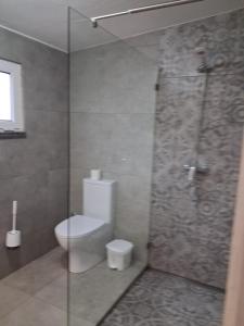 Koupelna v ubytování Quintal do Ti Zaquiel