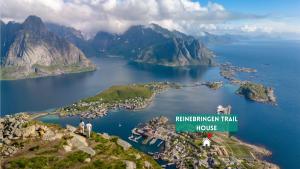 an island in the middle of a body of water at Reinebringen Trail House in Moskenes