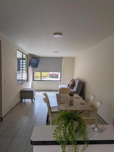 Et opholdsområde på Perfect Escape in Paipa Spacious, Cozy & Peaceful