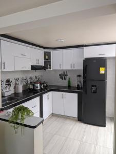 Køkken eller tekøkken på Perfect Escape in Paipa Spacious, Cozy & Peaceful