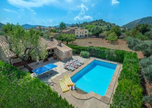 an aerial view of a villa with a swimming pool at Owl Booking Villa Can Gorreta - 5 Min Walk To The Old Town in Pollença
