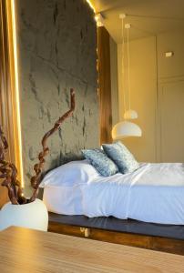 Una cama o camas en una habitación de ป๋ายดอยม่อนแจ่ม 7 fotos más