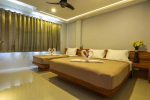 Кровать или кровати в номере Living Chilled Koh Tao