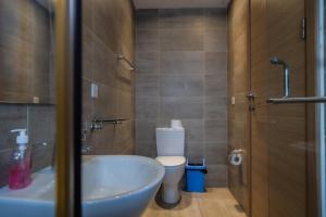 Koupelna v ubytování CasaNova Airport Suites