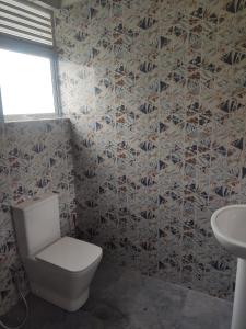 Koupelna v ubytování Nirmala Residence