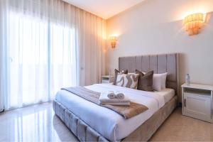 Ένα ή περισσότερα κρεβάτια σε δωμάτιο στο Exceptional Penthouse Private Terrace & Pool