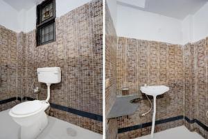 a bathroom with a toilet and a sink at Hotel O Radha Residency in Badarpur