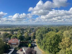an aerial view of a town with trees and a road at Kerzen Boutique in Bad Salzuflen