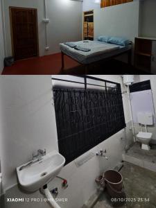 a bathroom with a sink and a bed in a room at MR SWER Homestay in Shillong