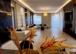 TV a/nebo společenská místnost v ubytování Villa Soleil Couchant