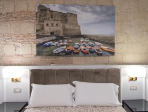 Postel nebo postele na pokoji v ubytování L'Infinito 88 Charmant Rooms