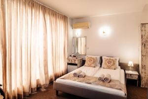 Postel nebo postele na pokoji v ubytování Hotel Kiev + 87 fotografií