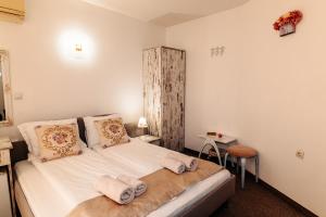 Postel nebo postele na pokoji v ubytování Hotel Kiev