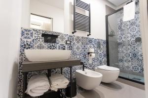 Koupelna v ubytování L'Infinito 88 Charmant Rooms + 108 fotografií